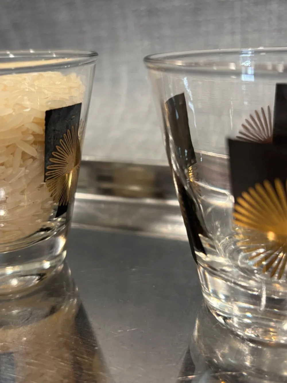 gold & black glass tumbler pouring 1:1 practical life lesson idlewild montessori